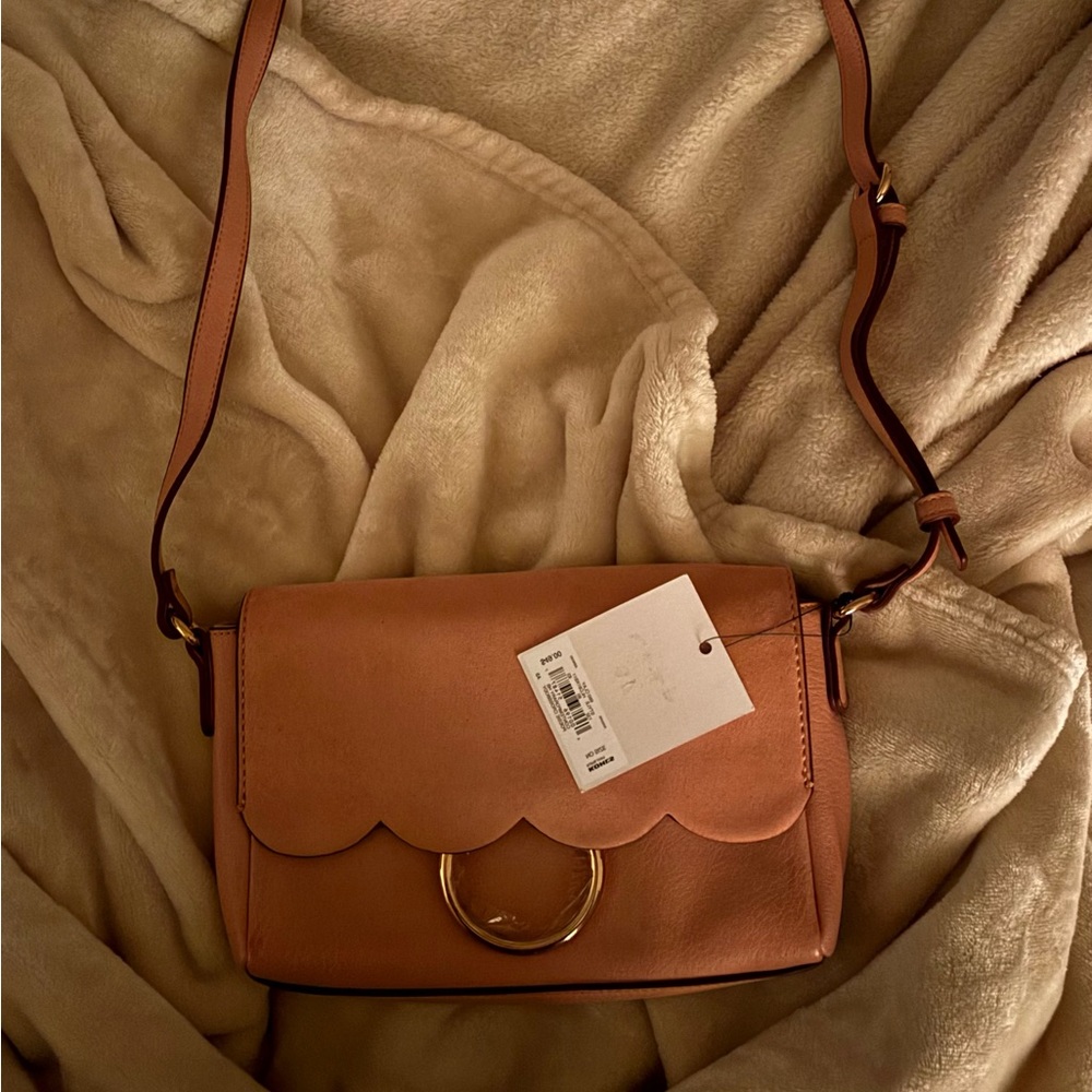 Chic Tan Crossbody Bag with Gold Accents